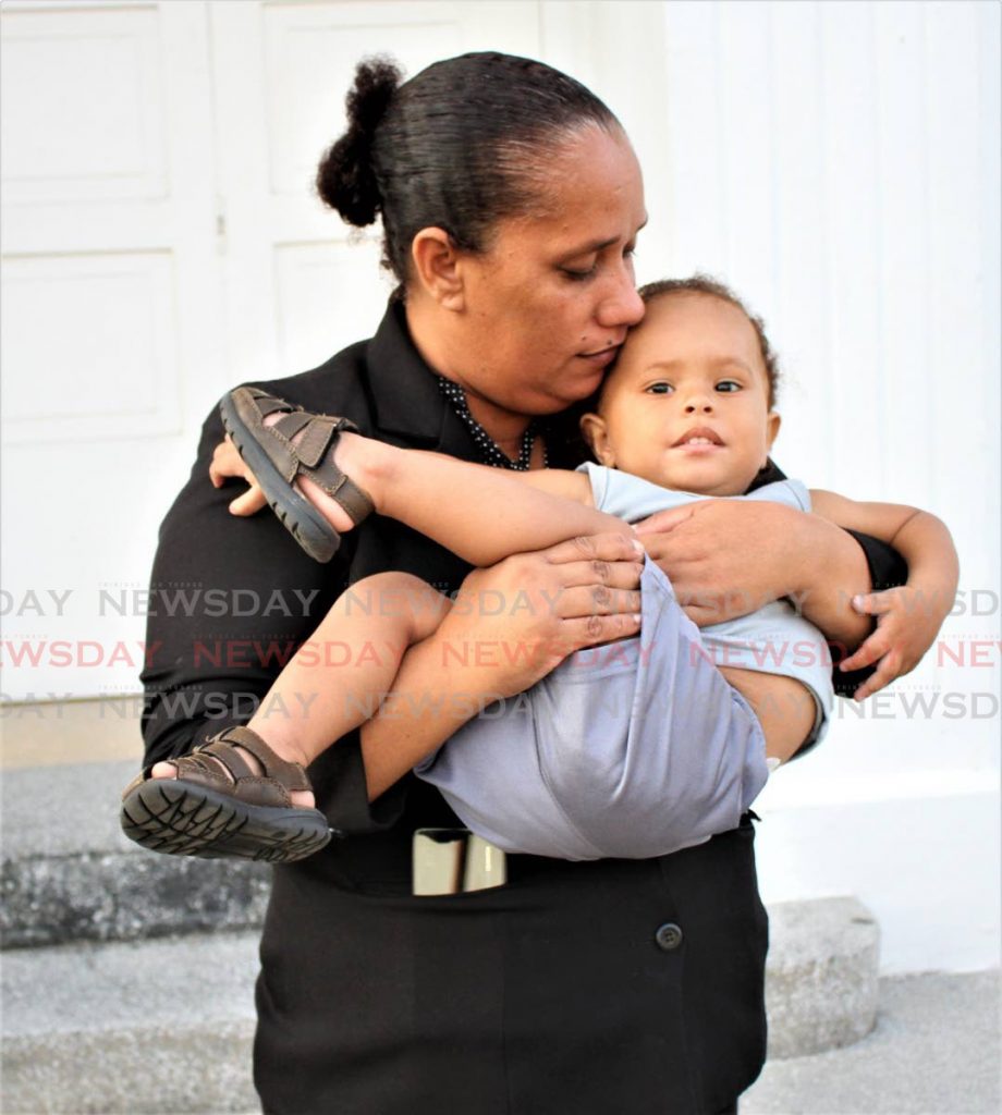 Lisa Morris-Julian when she was mayor of Arima, with her son Jesiah. - Photo by Angelo Marcelle