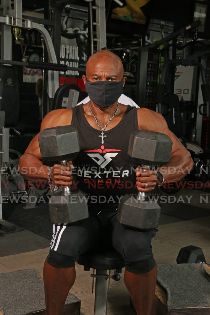 National bodybuilder Dexter Simon during a recent workout demonstration at the Asylum Training Centre, Diego Martin. - Marvin Hamilton