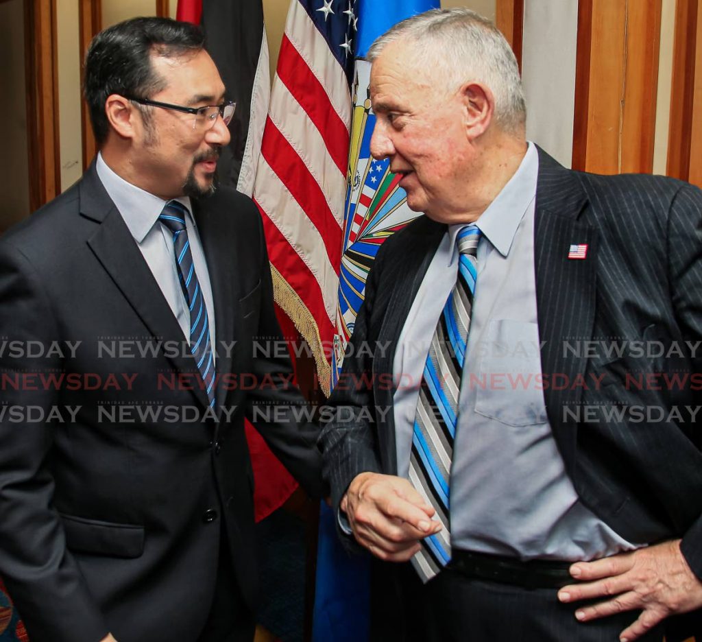 National Security Minister Stuart Young and US Ambassador Joseph Mondello at an event in 2018. - 