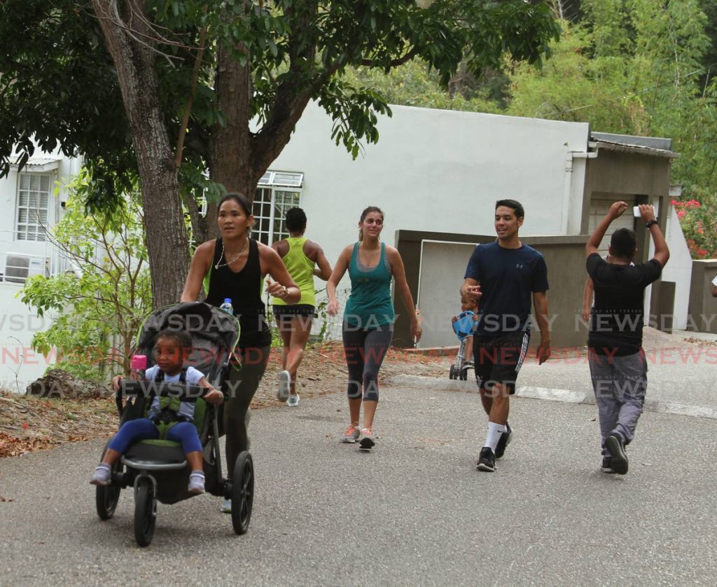 People of all ages flocked to the Lady Chancellor Hill to exercise after the Government lifted the covid19 restrictions on certain outdoor activities.  - Ayanna Kinsale