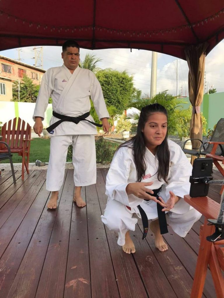 Professor Lino Velasquez and his daughter Elsa start a session of virtual karate classes through the Facebook group of Venezuelans in Trinidad. - Grevic Alvarado