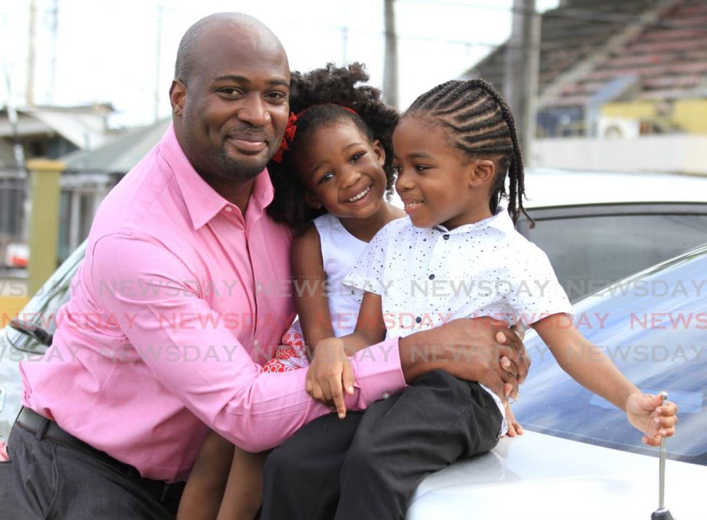 Idi Stuart, president of the TT Registered Nurses Association challenges himself to strike the right balance between work and fatherhood, and to make more time to be home with his family. - Ayanna Kinsale