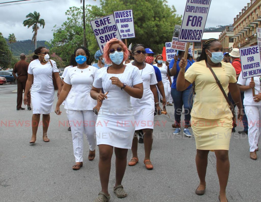 Nurses and other health-care workers protest at the Port of Spain General Hospital on Wednesday. - Ayanna Kinsale