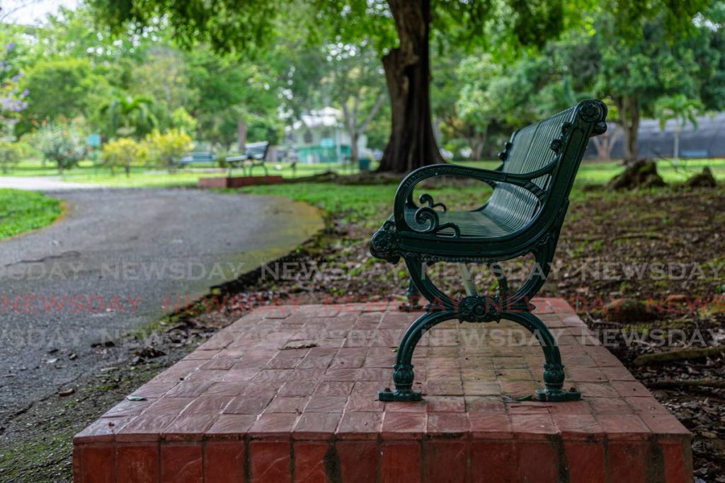 In this June 2020 file photo, an empty chair is evidence of no visitors being able to witness the beauty of the Royal Botanic Gardens in Port of Spain. Photo by Jeff Mayers