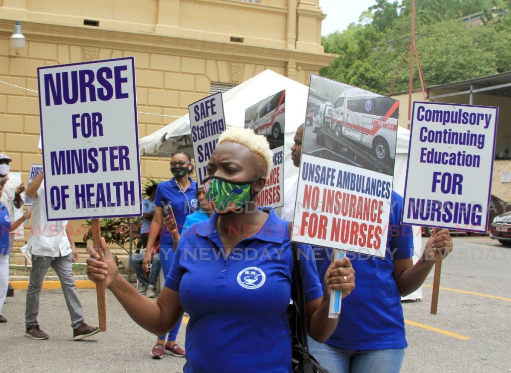 Nurses protest outside the St Ann's Phsychiatric Hospital on June 24.   - AYANNA KINSALE