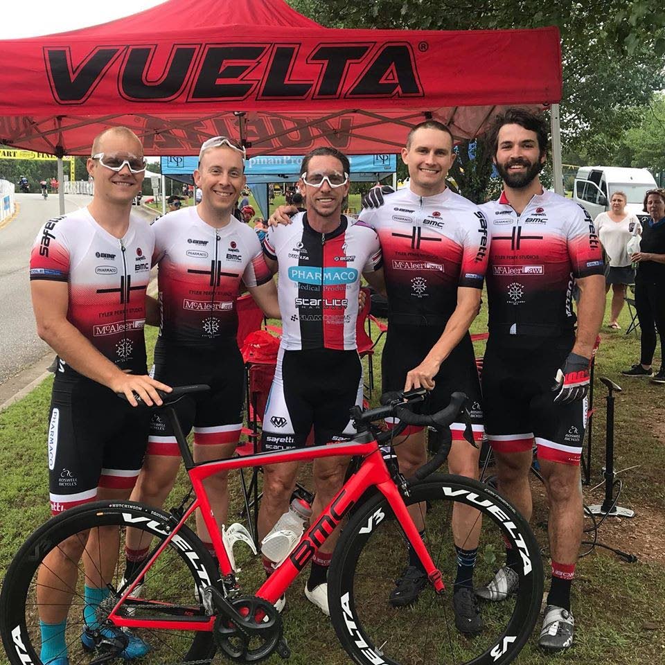 Ex-TT road cyclist Emile Abraham, centre, with his North Georgia Cycling Association team after pulling off a stage-win at the Tour of Georgia recently.  - 