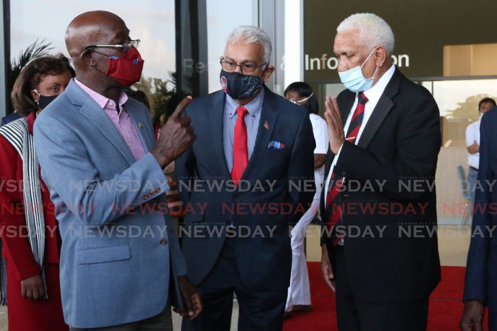 FLASHBACK: Prime Minister Dr Keith Rowley speaks with Health Minister Terrance Deyalsingh and UDECOTT chairman Noel Garcia at the official opening of the Point Fortin Hospital earlier this month.  - Marvin Hamilton