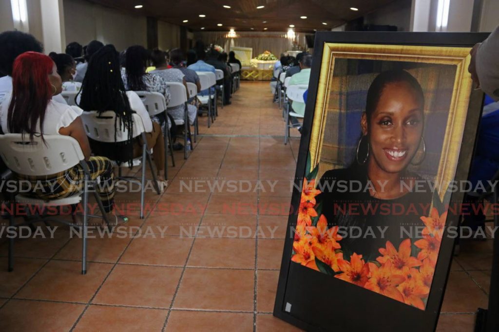 A memorial portraiture of Adana Stacey Dick at her funeral on Wednesday. - Marvin Hamilton