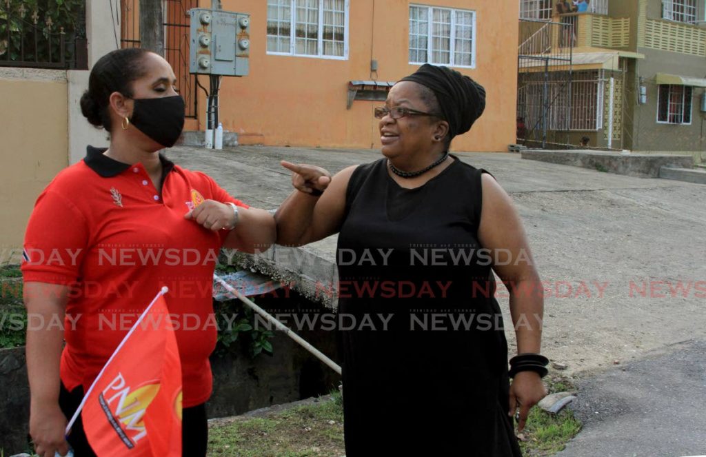 Newly selected PNM candidate for the D’Abadie/O’Meara constituency Lisa Morris-Julian greets a supporter during a walkabout in D’Abadie last Wednesday. - Ayanna Kinsale