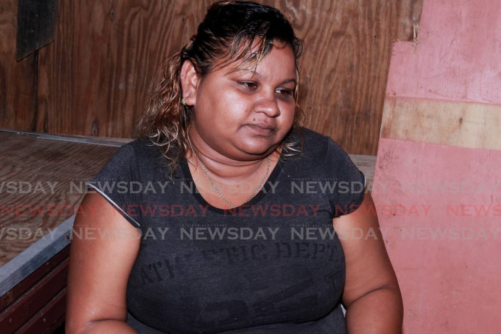 Dianedra Samuel, speaking at her home in Princes Town on Saturday, hopes the remains of body found in Moruga are not those of her missing 17-year-old son, Christon Marshall. PHOTO BY CHEQUANA WHEELER - 