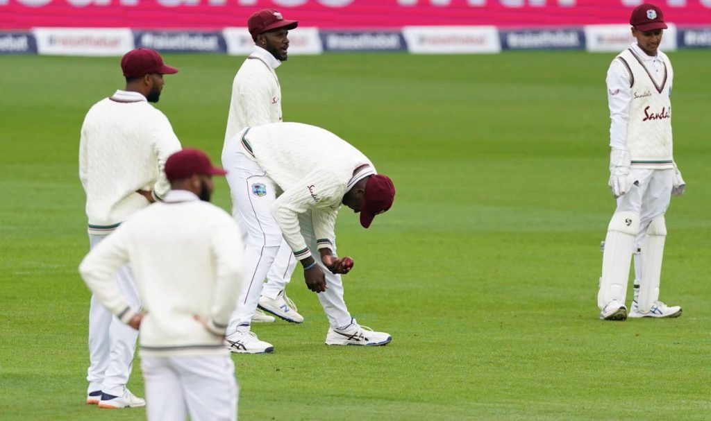 West Indies' captain Jason Holder (centre), reacts after dropping a catch of England's Dom Sibley during the first day of the second Test match between England and West Indies at Old Trafford in Manchester, England, on Thursday. (AP PHOTO) - 