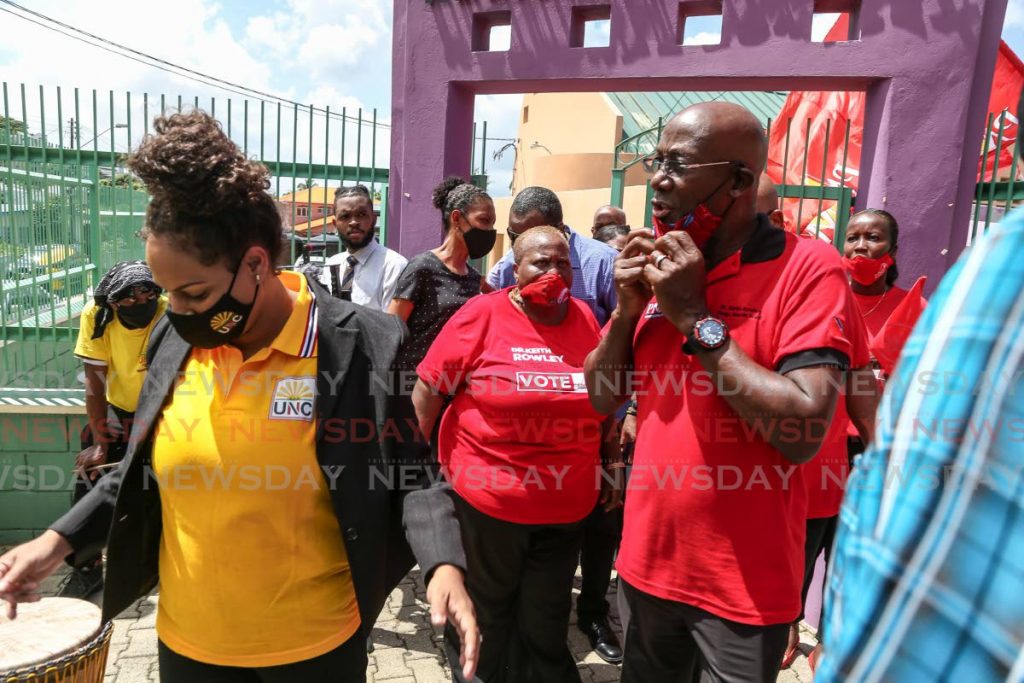 UNC candidate Marsha Walker walks away after PNM political leader, Prime Minister Dr Keith Rowley accused her of slandering him. Rowley and Walker filed nomination papers as Diego Martin West candidates at Point Cumana Regional Complex, Point Cumana on Friday. PHOTO BY JEFF MAYERS - Jeff Mayers