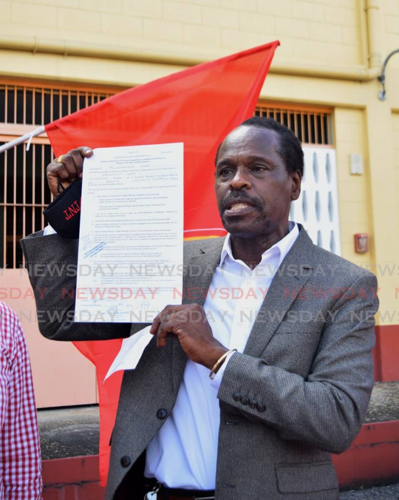 PNM candidate Fitzgerald Hinds for the electorial district of Laventille West shows his nomination papers at Malick Youth Facility, 7th Avenue, Barataria on Friday morning. - Vidya Thurab
