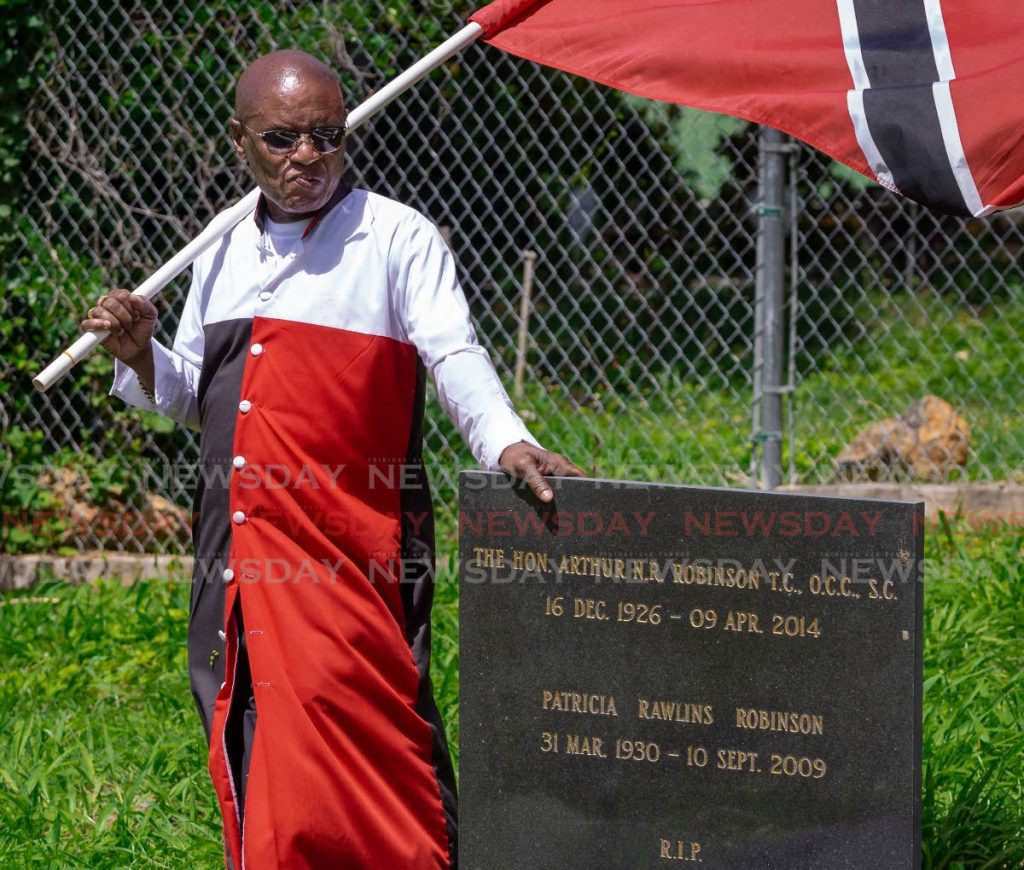Wendell Eversley at the Bacolet gravesite of former prime minister and president ANR Robinson on Friday.  - DAVID REID