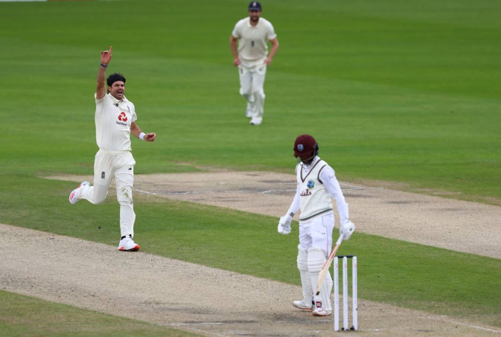 England's James Anderson (left), celebrates the dismissal of West Indies' Shai Hope (right), during the second day of the third Test match between England and West Indies at Old Trafford in Manchester, England, on Saturday. (AP PHOTO) - 