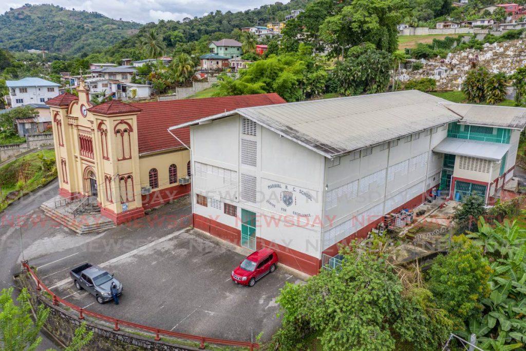 An aerial shot of Our Lady of Lourdes RC Church and Maraval RC Prime School in Maraval on Saturday. The school and church, as well as the Paramin church, will be closed and sanitised after a standard five student and family tested positive for covid19. PHOTO BY JEFF MAYERS - 