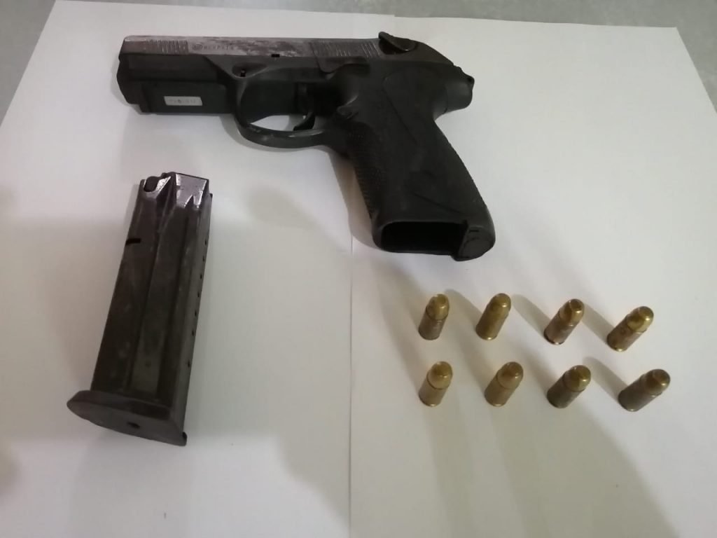 The gun and ammunition seized from a 20-year-old suspect. PHOTO COURTESY TTPS - TTPS