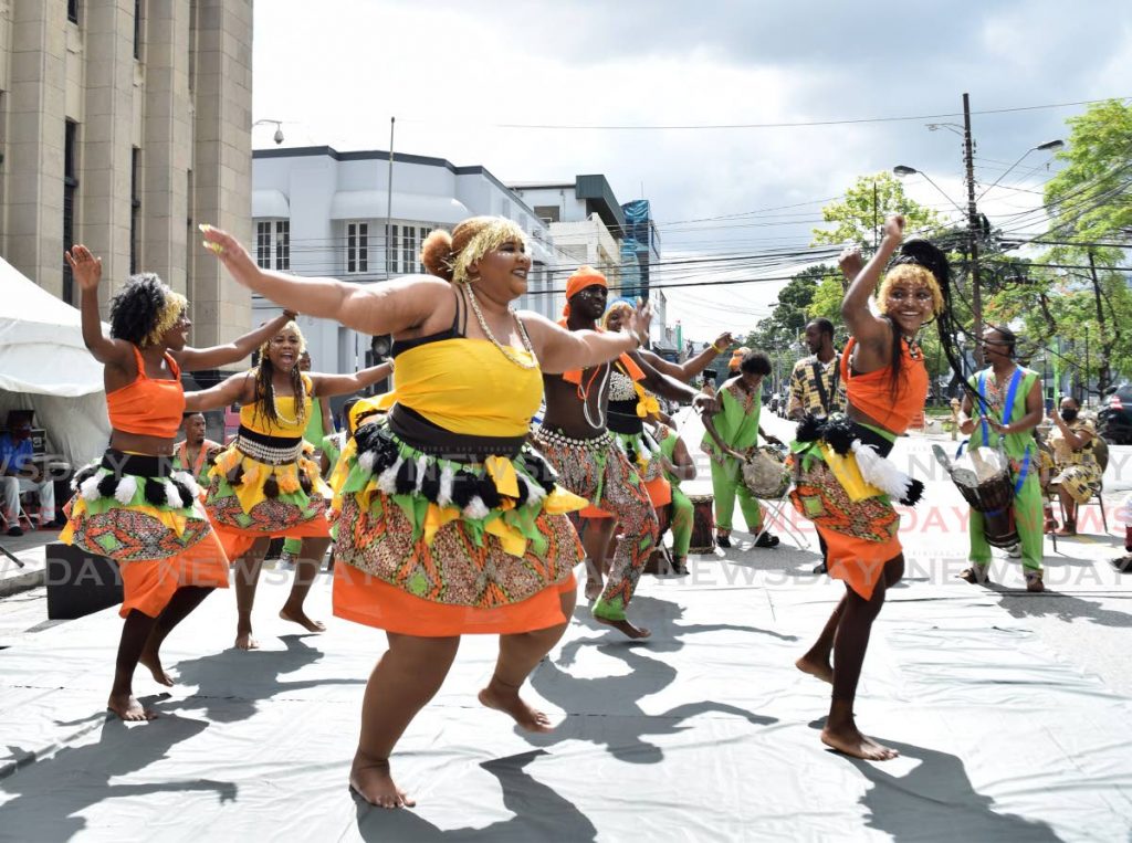 Wasafoli dancers and drummers perform at Emancipation Day celebrations, Treasury Building, Port of Spain on Saturday. PHOTO BY VIDYA THURAB - 