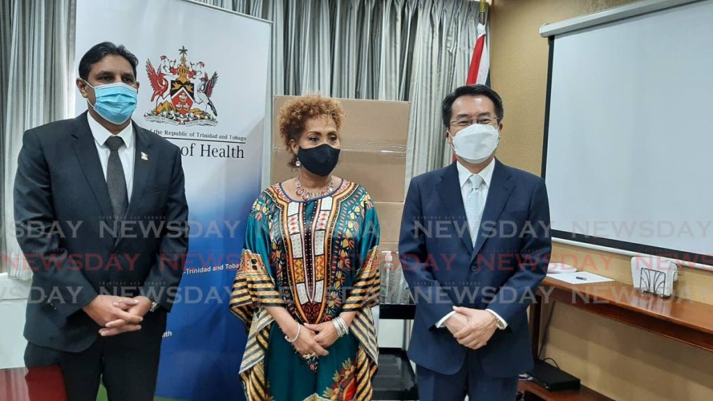  (From left) Chief Medical Officer Dr Roshan Parasram, Korean Ambassador Moonup Sung, and Deputy Permanent Secretary Brenda Jeffers  - 