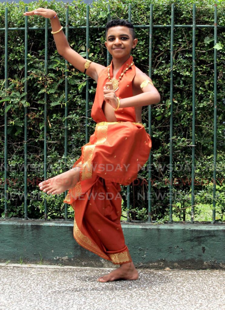 Christian Rohit Samuel shows the technique of a Bharatanatyam dancer after his performance at the PM’s National Day of Prayer,             St Patrick’s RC Church, Port of Spain on August 2. - Ayanna Kisnale
