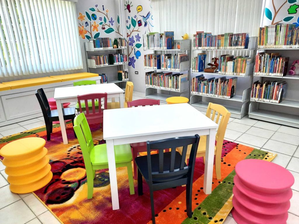 Brightly coloured and comfortable furniture in the tiny tots area. - 