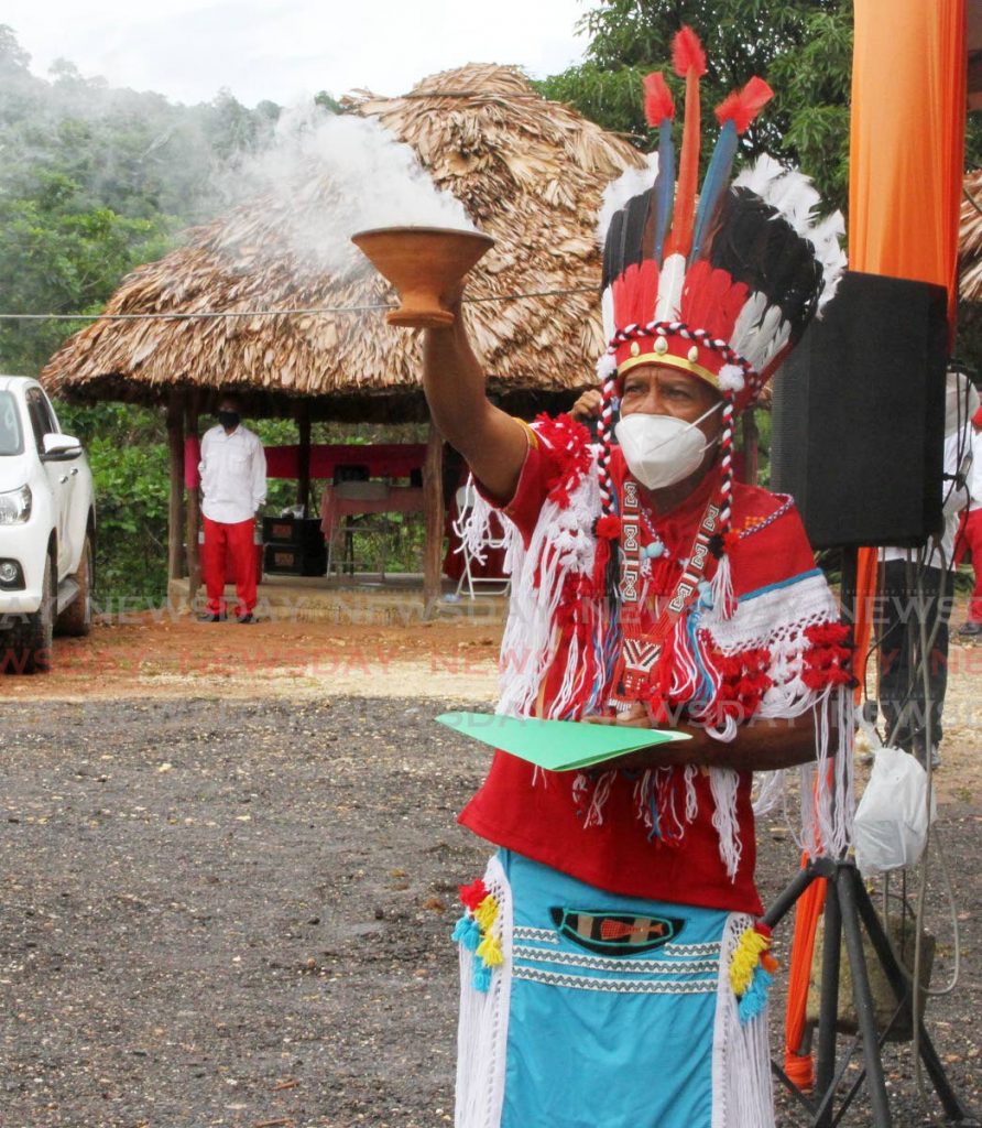 In this August 10 file photo chief of the Santa Rosa First Peoples Community Ricardo Bharath Hernandez performs a smoke ceremony on Sunday during  celebrations for the International Day of the World’s Indigenous Peoples in Arima.  - Angelo Marcelle