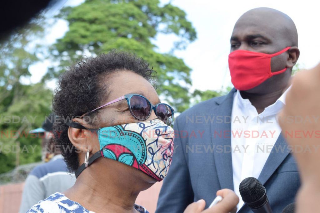 BACKING MY SON: While her son Brian, the PNM’s candidate for San Fernando East stands nearby, Hazel Manning speaks to reporters on Monday after she voted at the San Fernando Methodist Primary School.  - Vidya Thurab