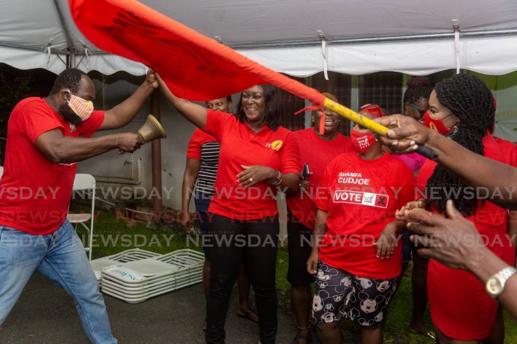 BACK IN POWER: PNM Tobago Council leader Tracy Davidson-Celestine, second from left, and Tobago West MP Shamfa Cudjoe revel in victory after the party retained the two Tobago seats in Monday's general election. PHOTO BY DAVID REID  - 