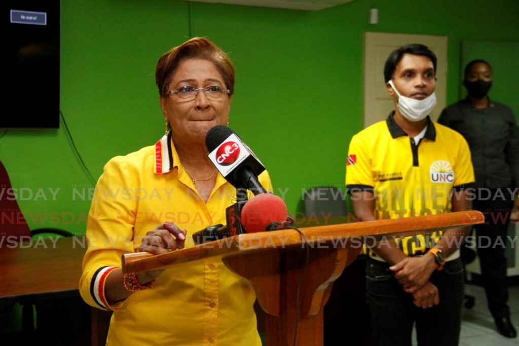 UNC political leader Kamla Persad-Bissessar makes a speech from her constituency office in Siparia on Monday night. - Marvin Hamilton 