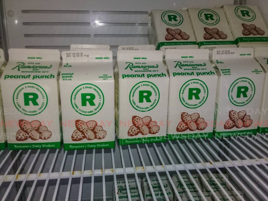 Ramsaran's peanut punch drinks on display at a San Juan supermarket on Wednesday. Supermarkets pulled Ramsaran's products following inflammatory comments on social media by a senior employee but on Friday ended the boycott.  - Sureash Cholai