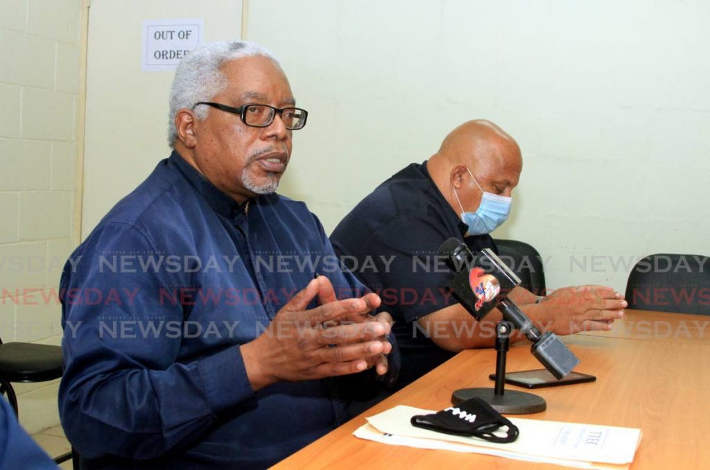Executive Vice President of the Oilfields Workers Trade Union (OWTU) Peter Burke speaks during a press conference on Henry Street, Port of Spain. Also in the photo is First Vice President Ricky Benny.  - Ayanna Kinsale