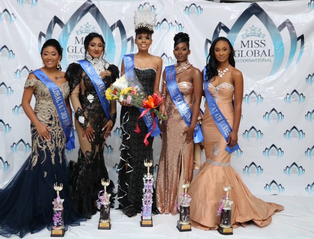 Shenice Nyack Miss Global TT, centre with runners-up Natasha Mohammed, Leana Alleyne, Sarah-Lee Su and Karen Rampersad. - 
