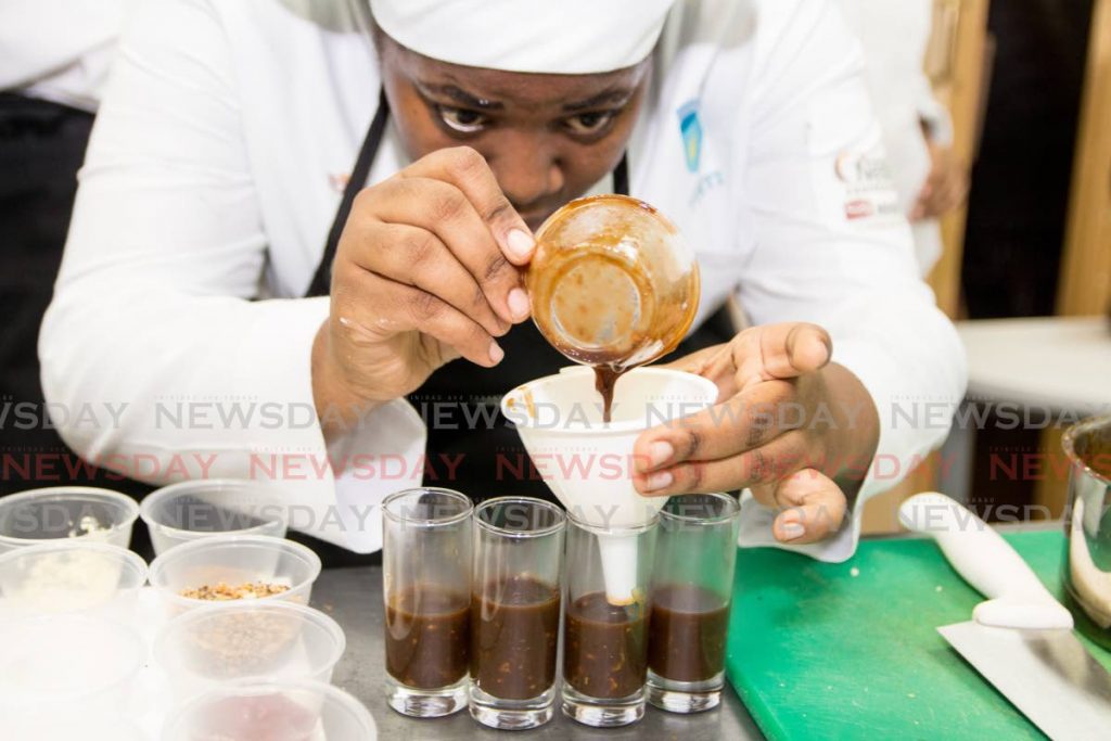 In this file photo a student of the TT Hospitality and Tourism Institute prepares a dessert at the Chaguaramas-based facility. On Friday, the institute said it had to close because of the impact of covid19 and financial challenges. - Sureash Cholai