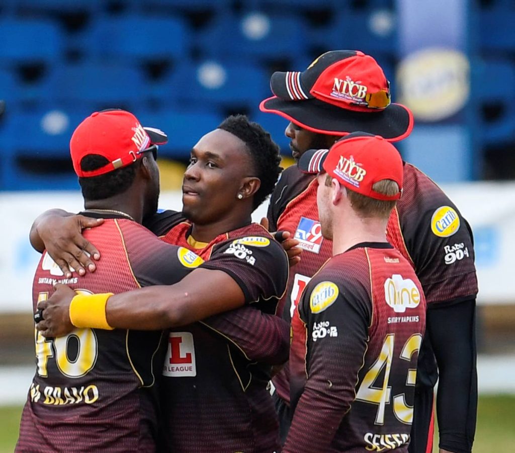  Dwayne Bravo (2L) of Trinbago Knight Riders celebrates the dismissal of Rahkeem Cornwall of St Lucia Zouks and his 500th T20 wicket during the Hero Caribbean Premier League match 13 between St Lucia Zouks and Trinbago Knight Riders at Queen's Park Oval, St Clair on Wednesday . - CPL T20 via Getty Images