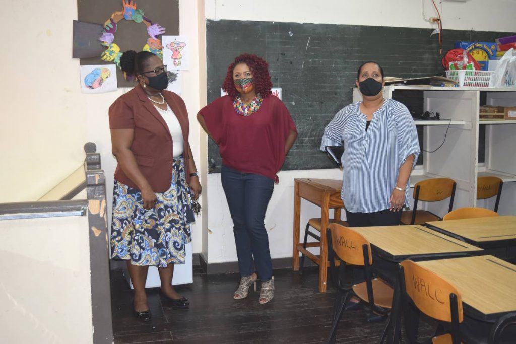 Education Minister Dr Nyan Gadsby-Dolly, centre, Minister in the Education Ministry Lisa Morris -Julian, right with Marsha Williams, principal of Pointe-a-Pierre Government Special School, during a visit on Saturday. PHOTO COURTESY MINISTRY OF EDUCATION - 