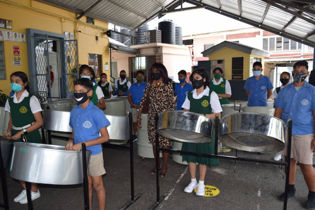 Students of Avocat Vedic Primary School practise on their new pans. - 
