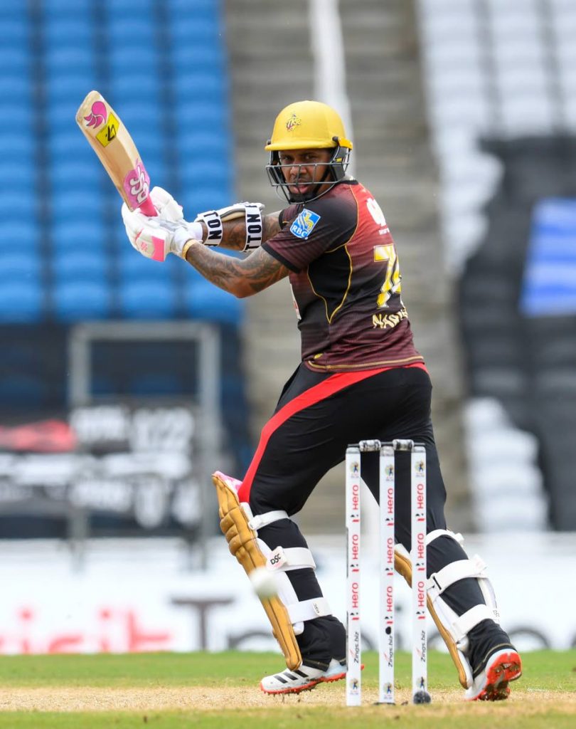 In this Aug 18 file photo, Sunil Narine of Trinbago Knight Riders hits a four during the Hero Caribbean Premier League opening match between Trinbago Knight Riders and Guyana Amazon Warriors at the Brian Lara Cricket Academy. CPL T20 via Getty Images - 