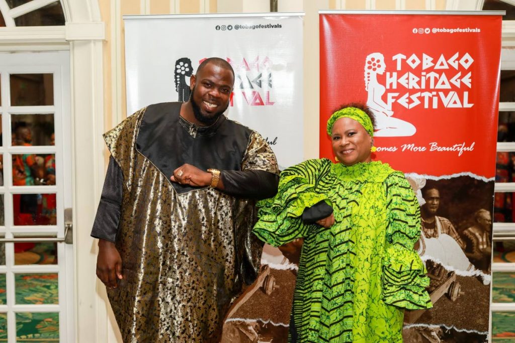 Tobago Festivals Commission chairman Dr Denise Tsoiafatt-Angus, right, and assistant secretary in the Division of Tourism, Culture and Transportation Shomari Hector at a Tobago Heritage Festival event. - 
