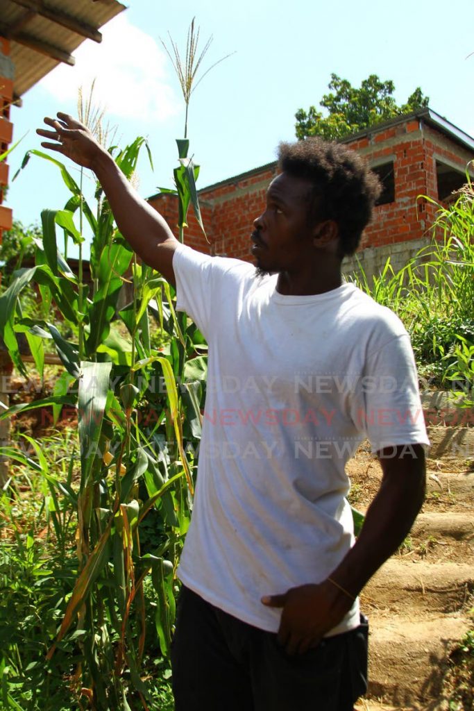 Isiah Worrell, brother-in-law of Sherian Huggins who was killed in a domestic dispute on Wednesday morning, speaks with Newsday at her Dan Kelly, Port of Spain home. - ROGER JACOB