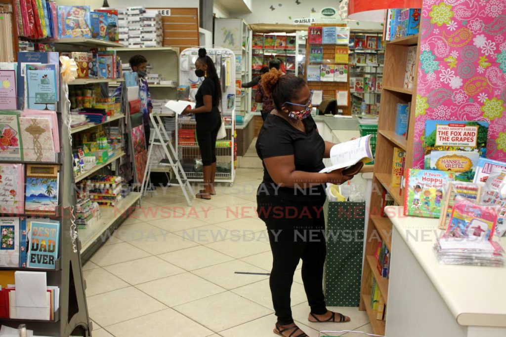 Usually at this time of year Nigel R Khan in Port of Spain would be packed with customers shopping for back-to-school goods. As it is, very few people have ventured into the store for that purpose on Tuesday as such supplies are no longer in demand as students returned to school but in virtual classrooms. - Angelo Marcelle