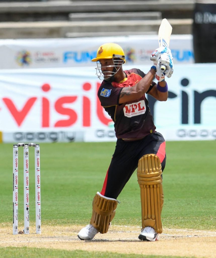 Lendl Simmons, of Trinbago Knight Riders, hits a four during match 23 of the Hero Caribbean Premier League between Trinbago Knight Riders and St Kitts & Nevis Patriots, at Brian Lara Cricket Academy,Tarouba, on Wednesday. - CPL T20 via Getty Images