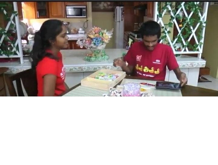 Rahul doing stimulating activities with his sister Maya. - 