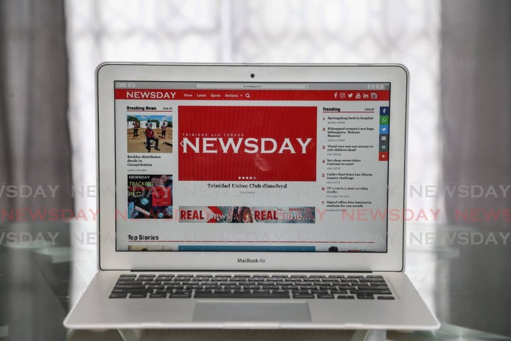 Newsday's website presents news in realtime. Most traditional media newsrooms include digital news platforms. PHOTO BY JEFF MAYERS - 