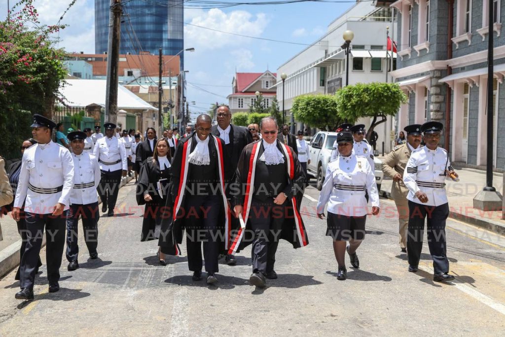 Chief Justice Ivor Archie leads the procession of judges and attorneys from the Holy Trinity Cathedral in Port of Spain to the Hall of Justice during the ceremonial opening of the law term last year. - JEFF K MAYERS