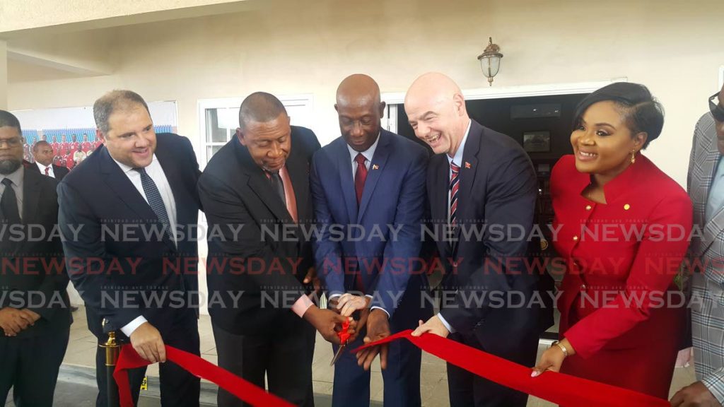 (From left to right) In this Nov 18, 2019 file photo, Concacaf president Victor Montagliani, former TTFA president David John-Williams, PM Dr Keith Rowley, FIFA president Gianni Infantino, and Sport minister Shamfa Cudjoe cut the ribbon at the opening of the Home of Football,in Couva. PHOTO BY NARISSA FRASER - 