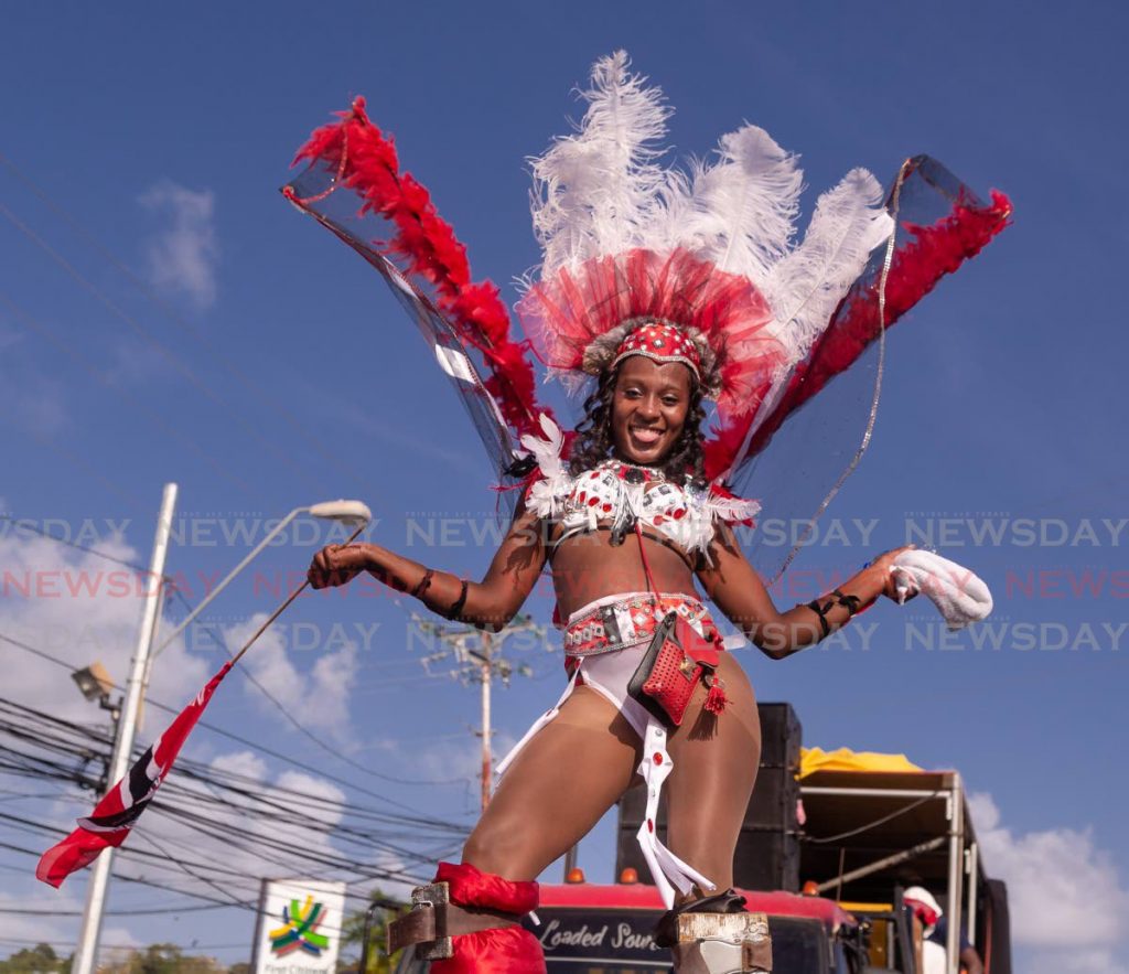 A moko jumbie in national colours was one of the spectacles on Carnival Tuesday in Scarborough earlier this year. - DAVID REID 