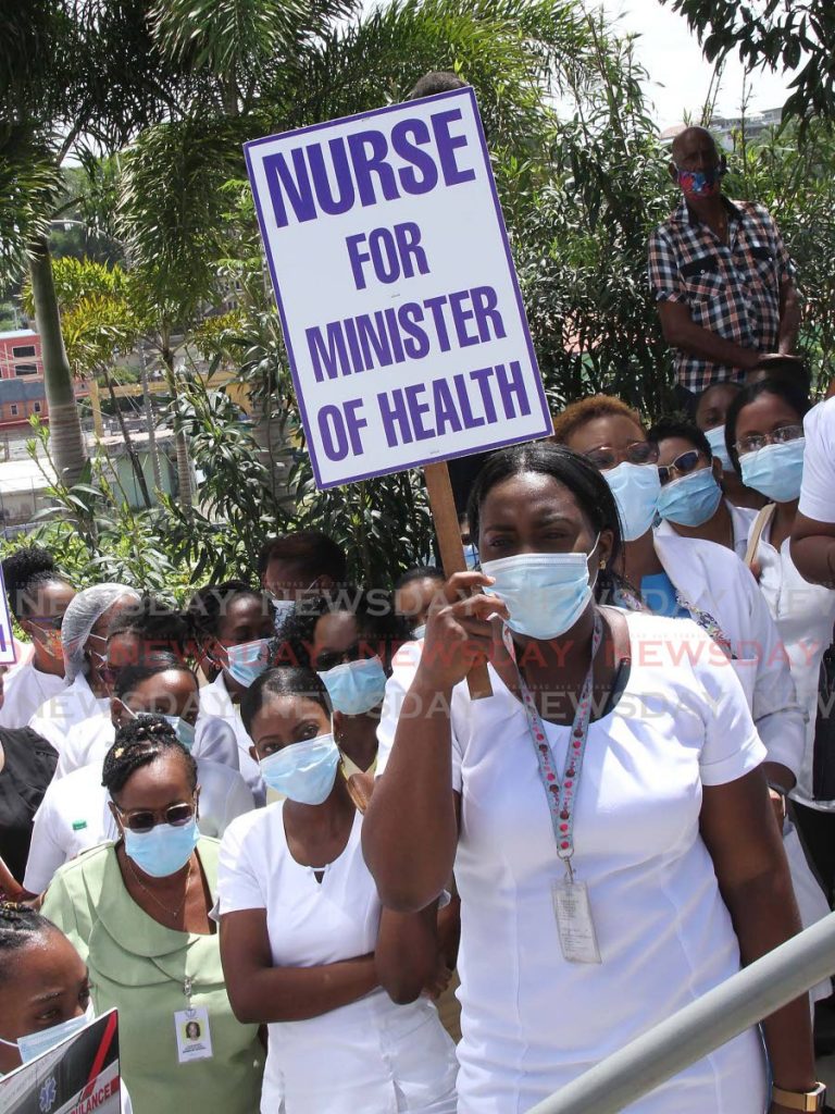 In this June 18, 2020 file photo nurses in San Fernando protest for better working conditions at health institutions.  - 
