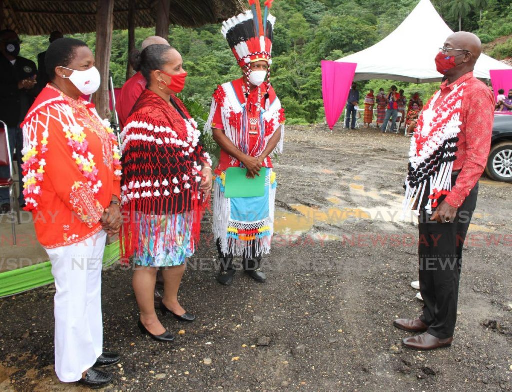 In this file photo Prime Minister Dr Keith Rowley is greeted by Ambassador Penelope Beckles, left, Arima Mayor Lisa Morris-Julien and Chief of the Santa Rosa First Peoples Community, Ricardo Bharath Hernandez, at the celebration of the International Day of the World's Indigenous Peoples, at the First Peoples Heritage Site in Arima. 