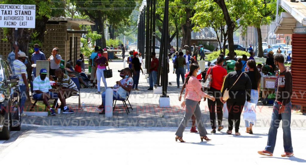 In this September 25 file photo, members of the public go about their business on Brian Lara Promenade, Port of Spain. Health Minister Terrence Deyalsingh says TT's covid19 cases average 30-40 per day. PHOTO BY SUREASH CHOLAI - 