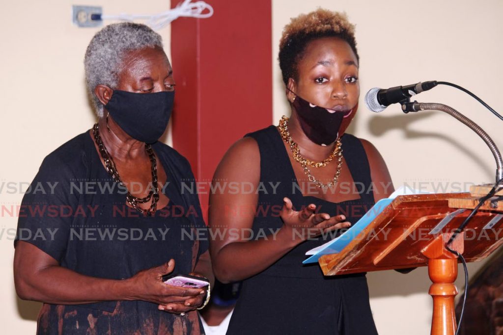 SAYING GOODBYE: Julia Mc Milan-Jeffrey and her daughter Tehilla Jeffery, wife and daughter of the late Fitzgerald Jeffery, gave the eulogy at his funeral service at the St Joseph RC Church, Vance River, on Saturday. - CHEQUANA WHEELER
